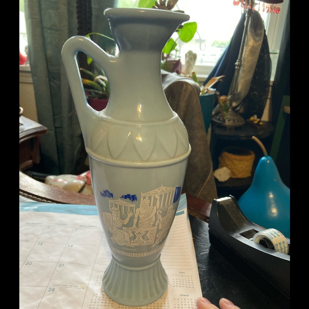 Really cool old vase with the worlds great philosophers printed on it. Unique!